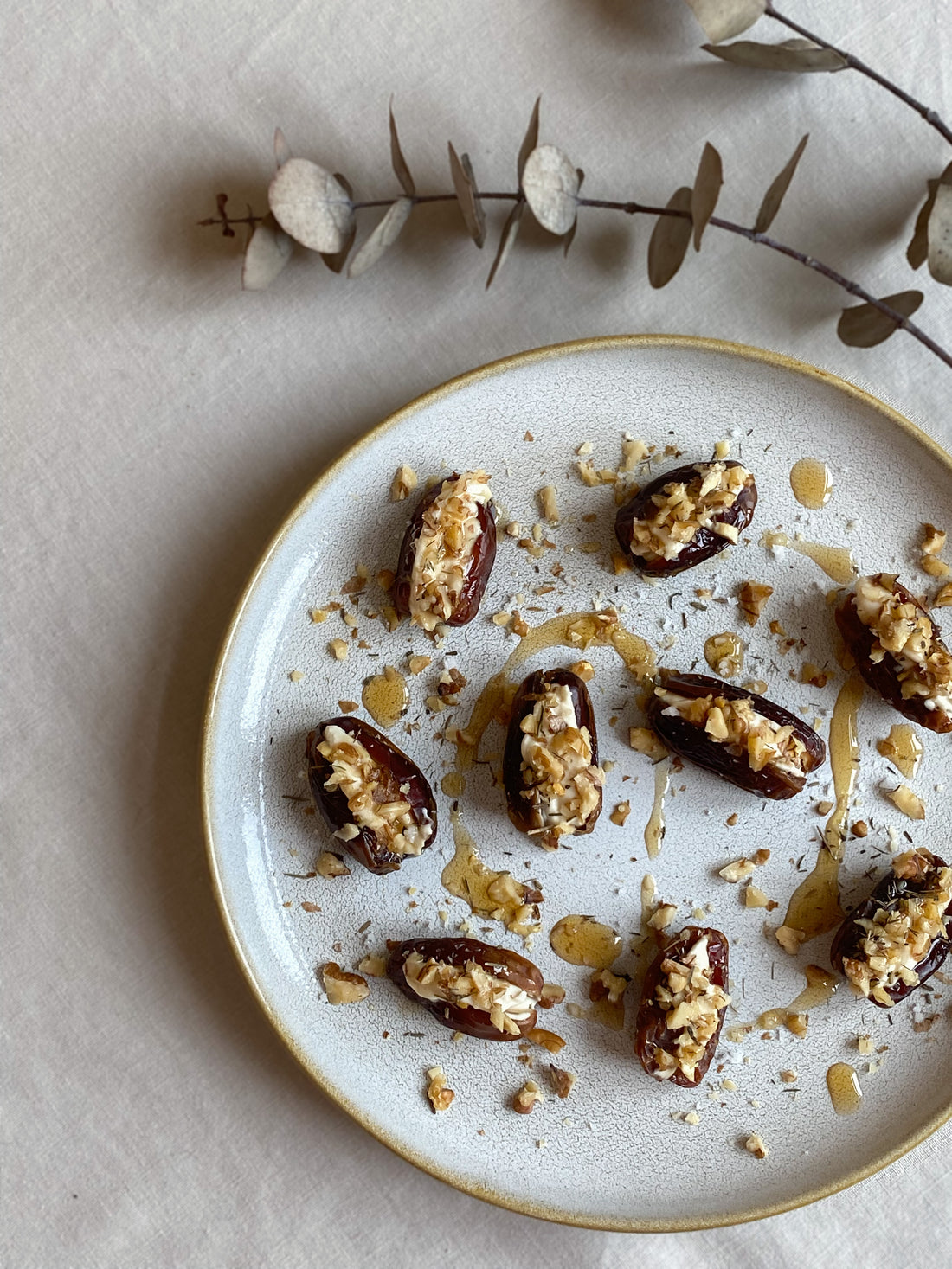 Dates filled with a vegan smoked cream cheese, agave, thyme, walnuts and fleur de sel